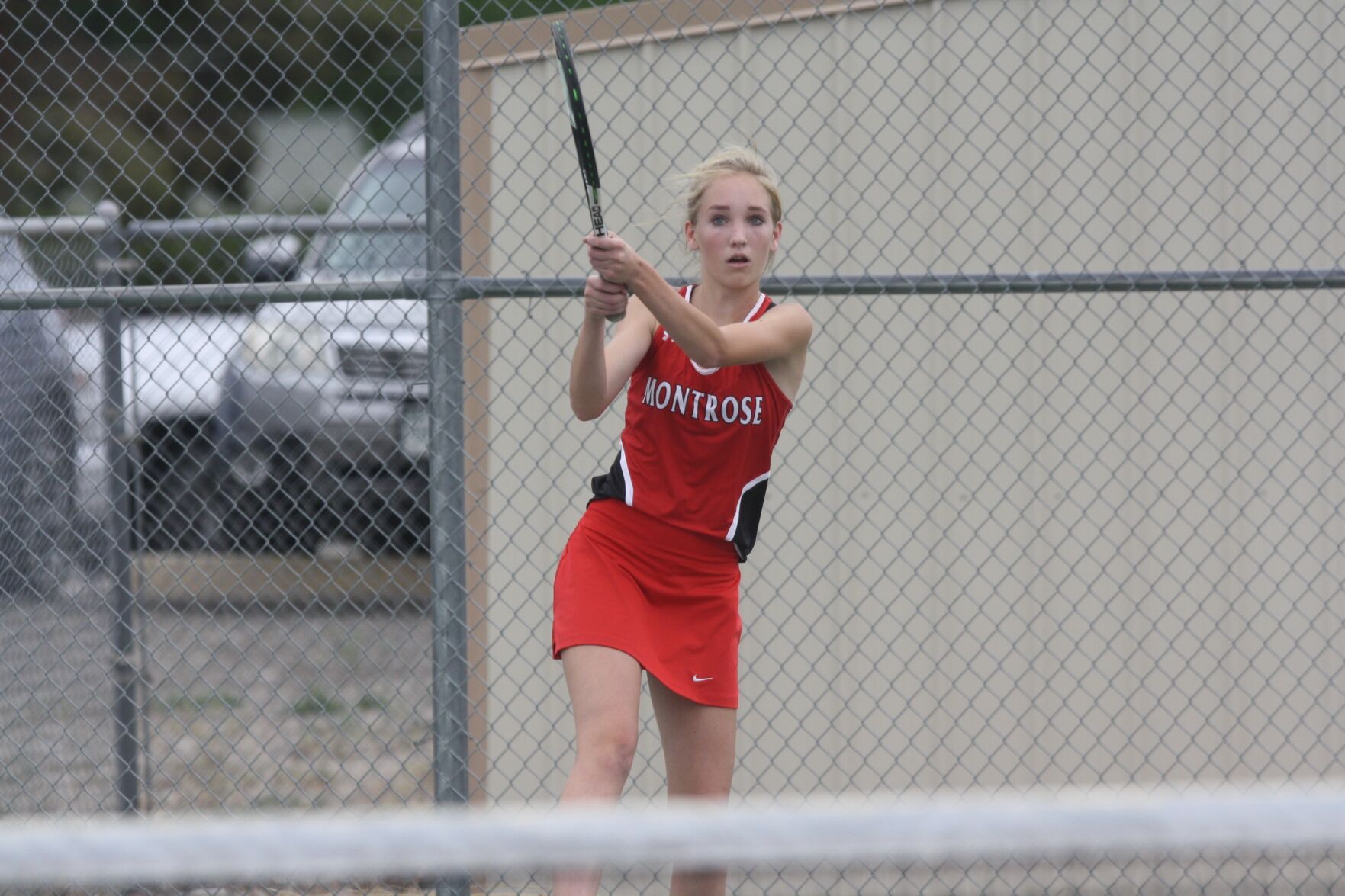 Montrose girls tennis Andie Blowers backhand shot v Durango